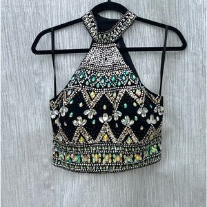 Fiesta Fashion top with beaded detail. Top Fully lined. No stretch in top